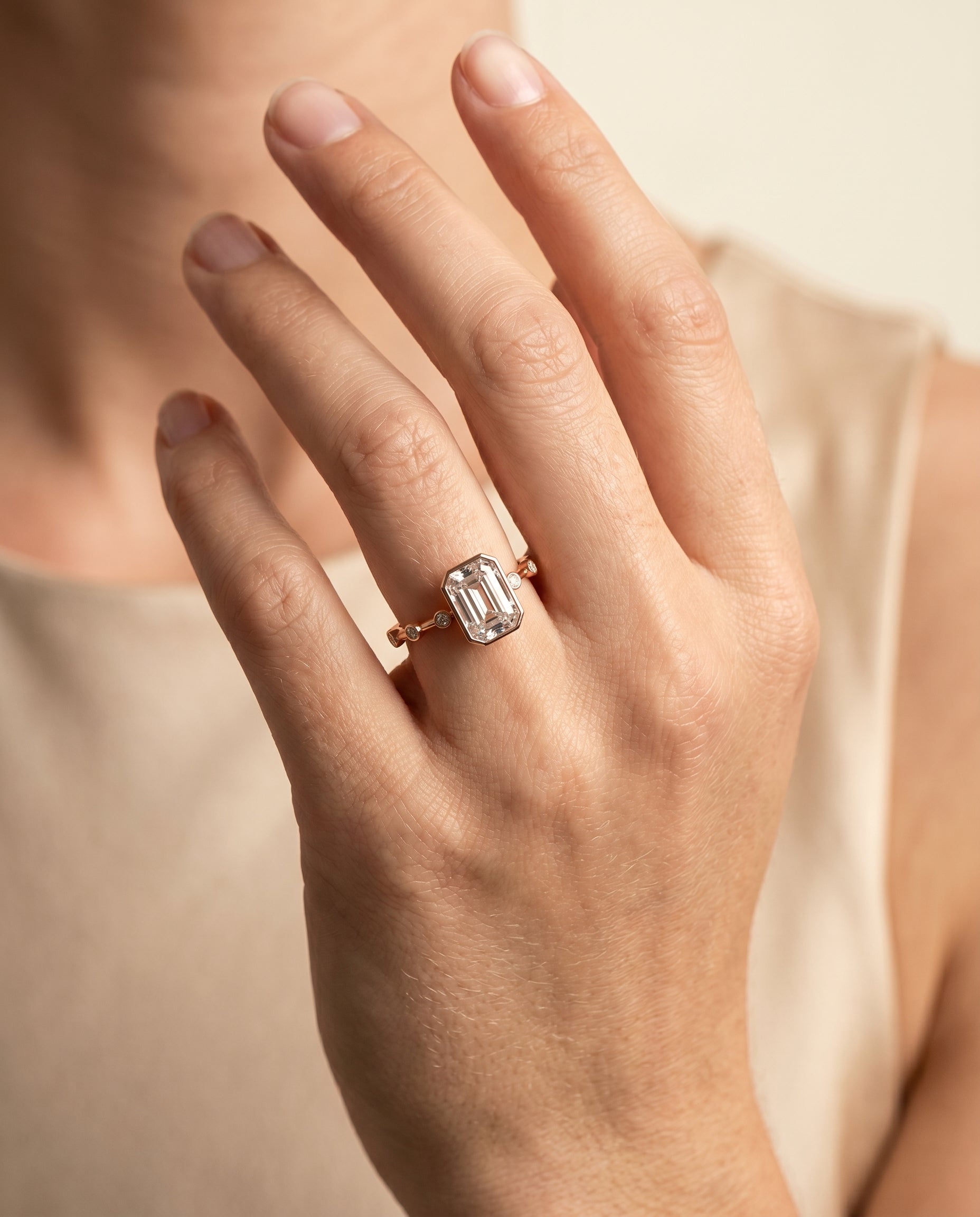 The Brandi engagement ring setting in 14K Rose Gold, bezel accent solitaire cut design | RockHer