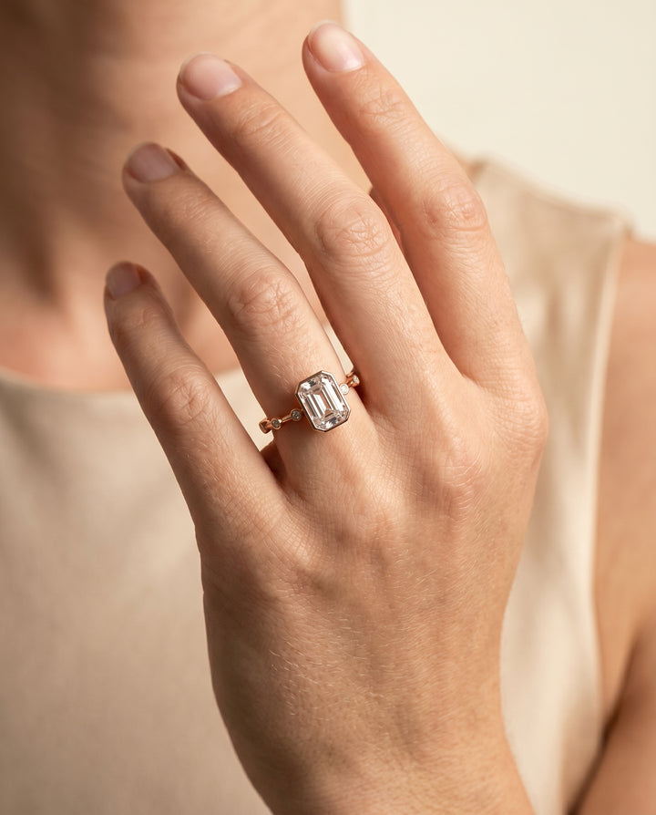 The Brandi Bezel Accent Solitaire Emerald Cut Engagement Ring Setting in 14K Rose Gold