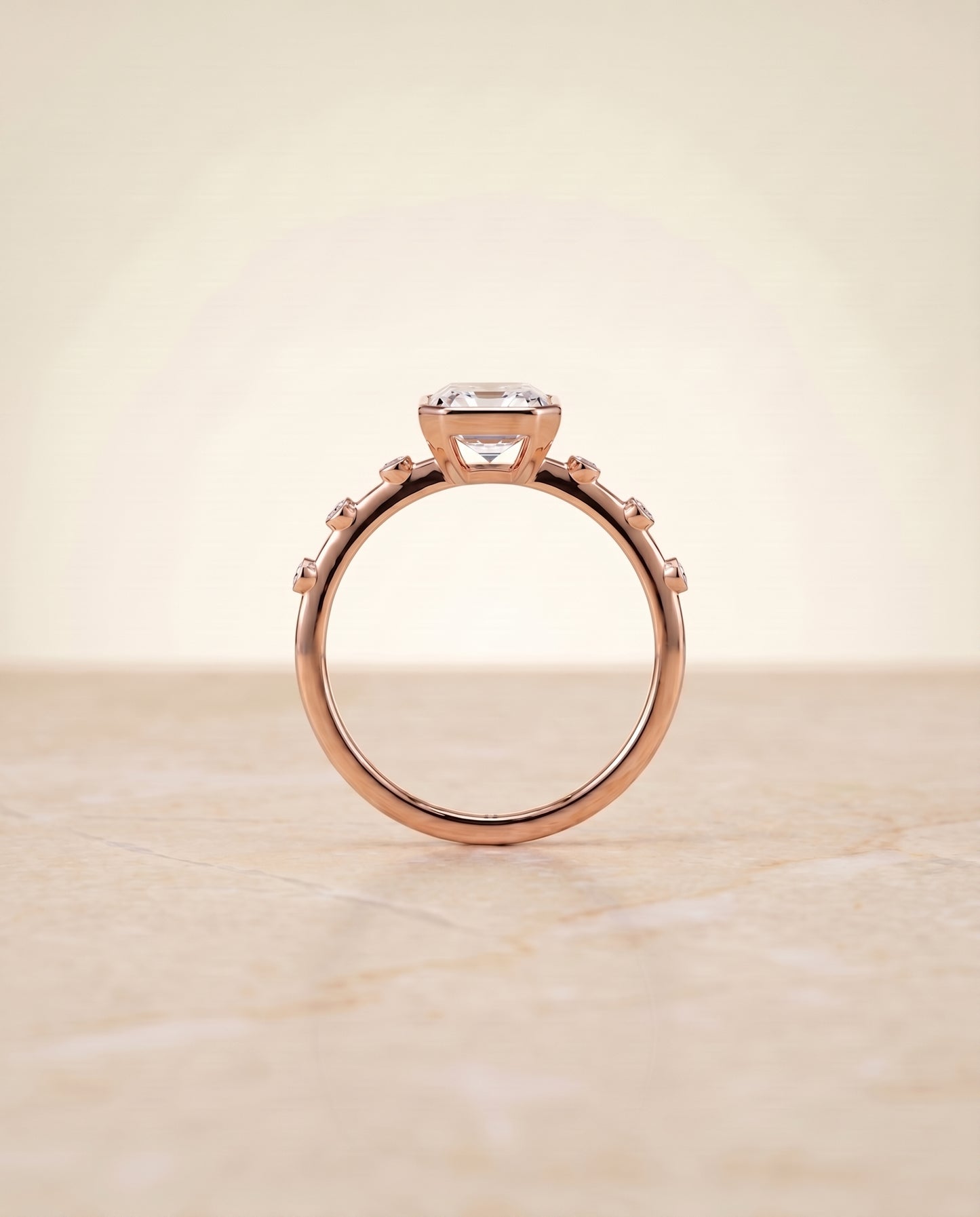 The Brandi Bezel Accent Solitaire Emerald Cut Engagement Ring Setting in 14K Rose Gold