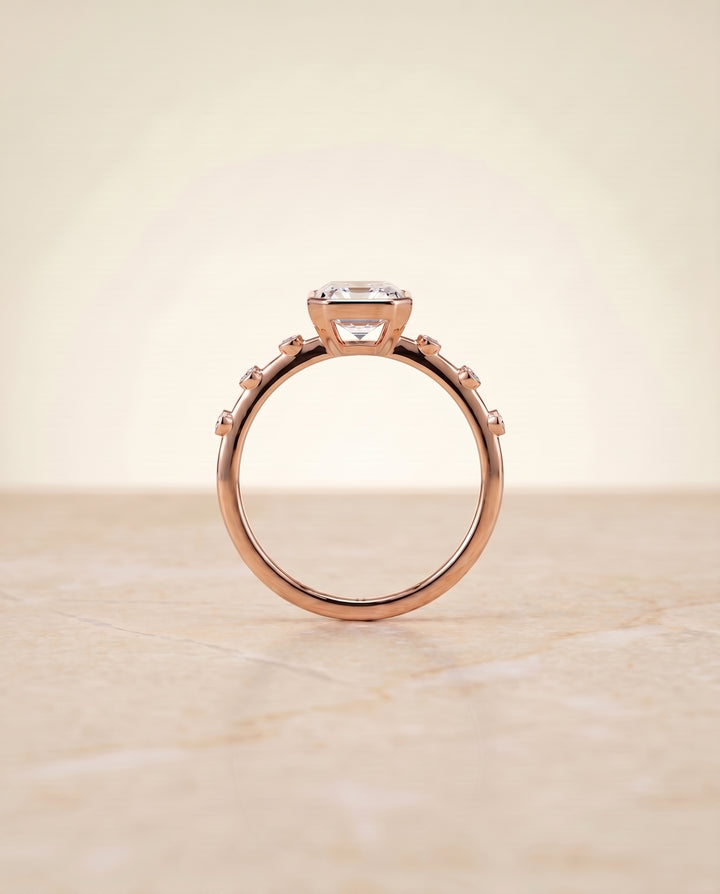 The Brandi Bezel Accent Solitaire Emerald Cut Engagement Ring Setting in 14K Rose Gold