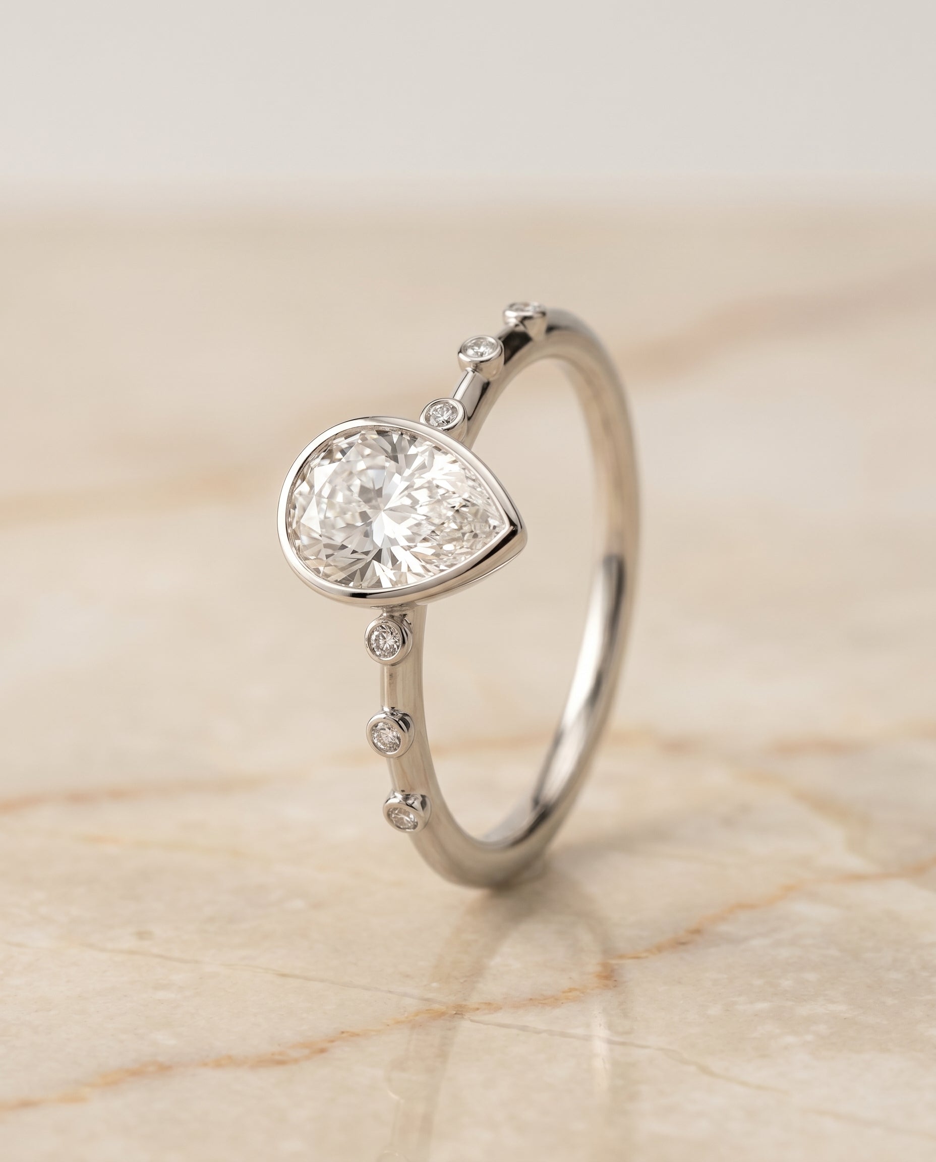 Bezel Accent Solitaire styling on The Brandi princess engagement ring setting | RockHer