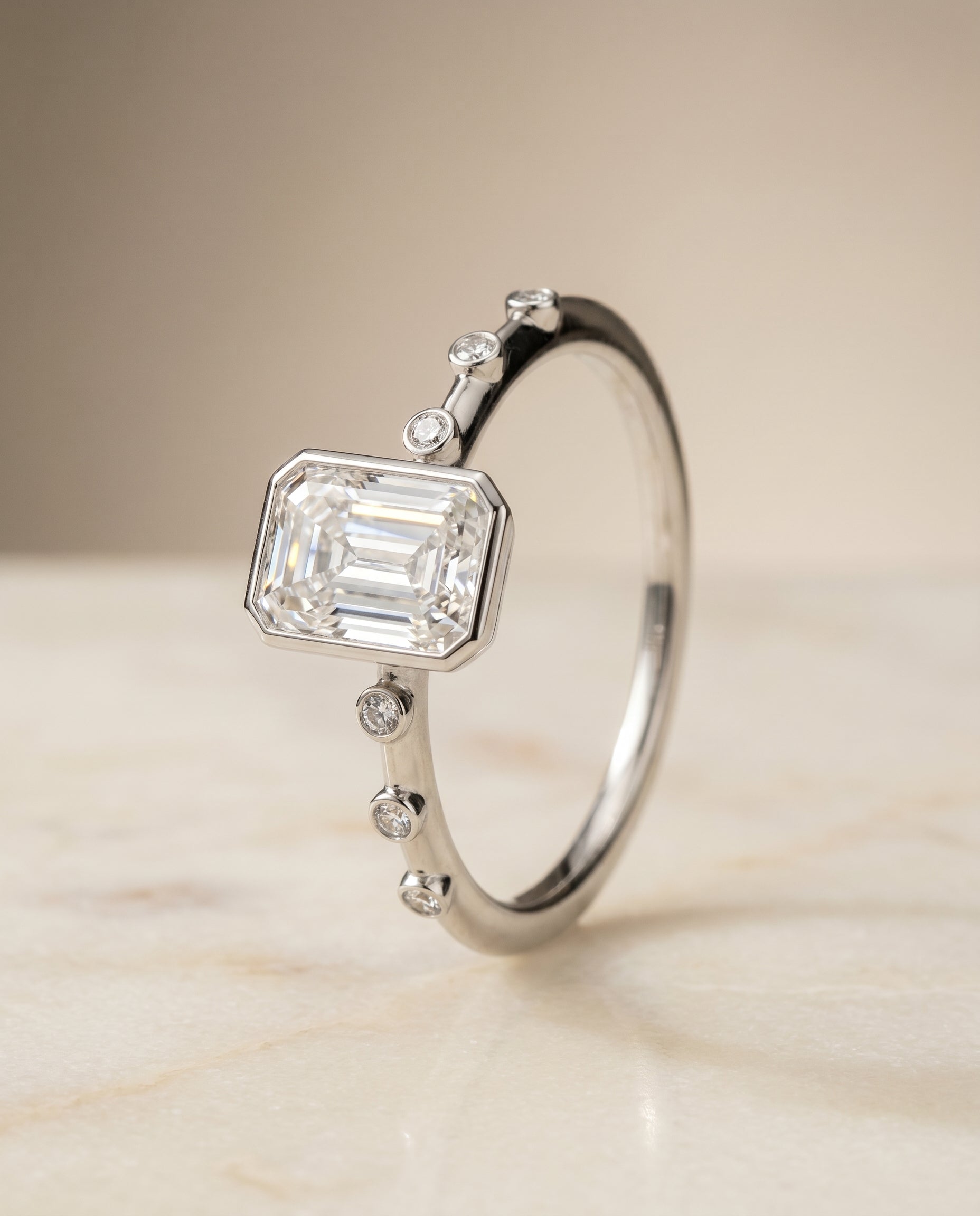Bezel Accent Solitaire Cut styling on The Brandi radiant engagement ring setting | RockHer