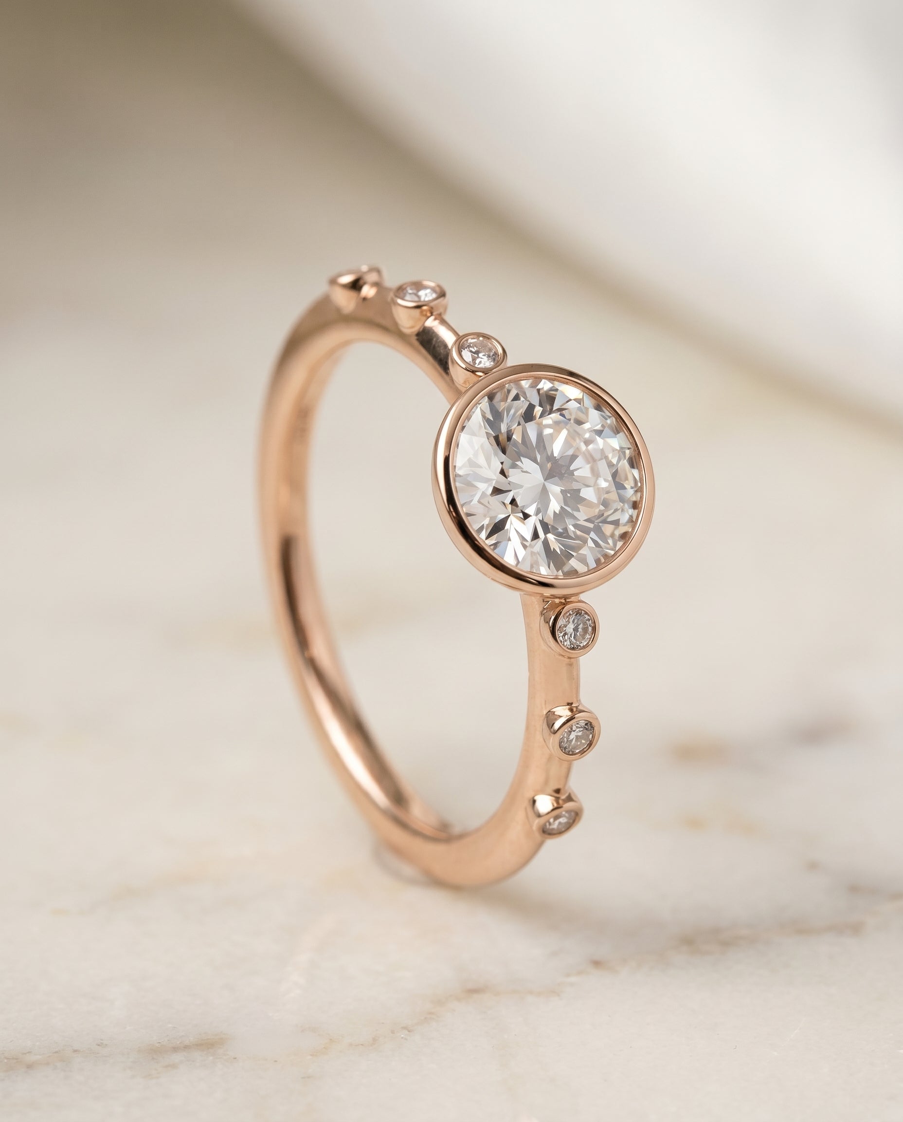 Bezel Accent Solitaire styling on The Brandi round engagement ring setting | RockHer