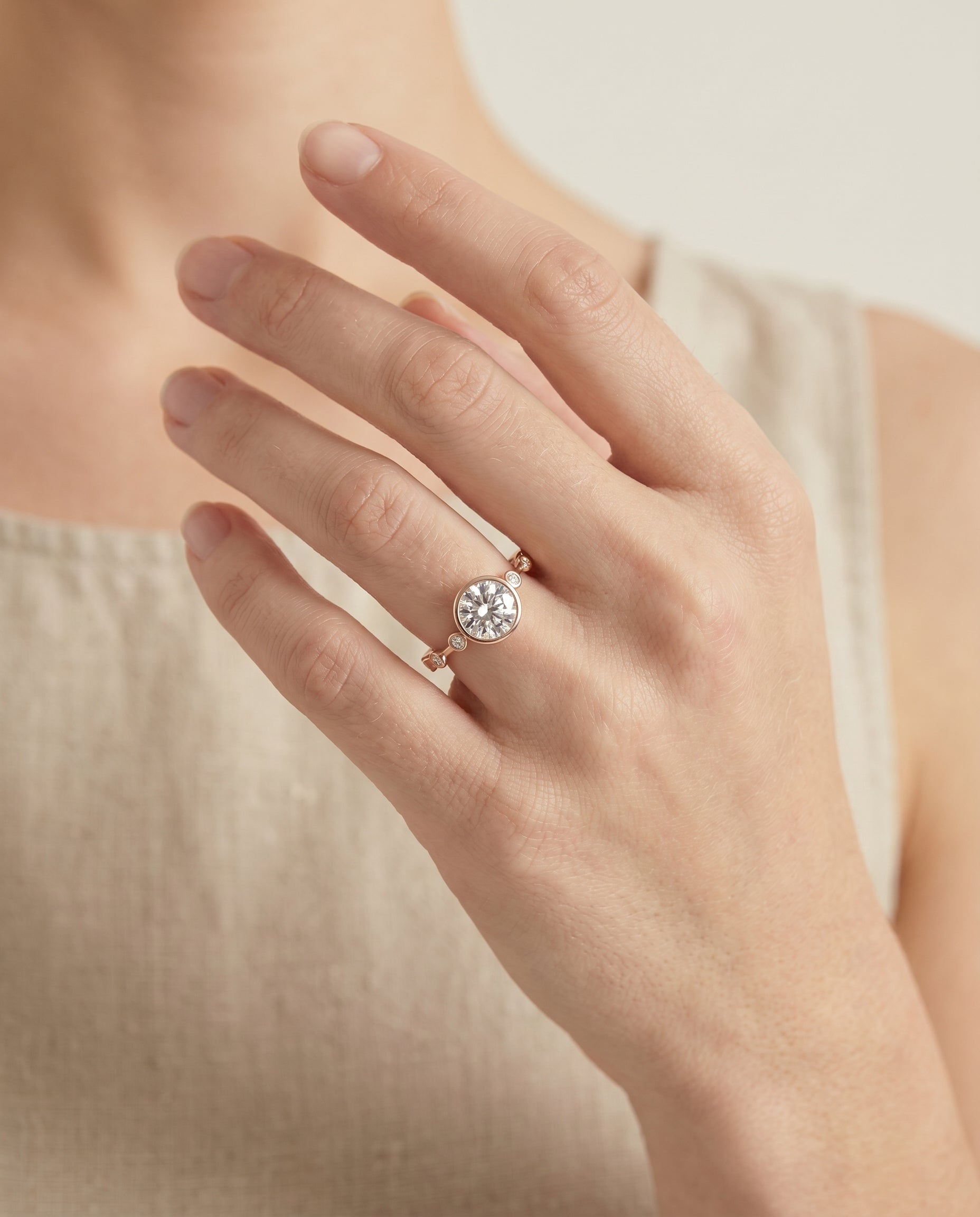The Brandi engagement ring setting in 14K Rose Gold, bezel accent solitaire design | RockHer