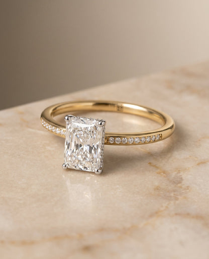 Brenda Select 18ky With High Hidden Halo Prong Set Diamonds Ey80312hivs Ra100 Radiant Cut Lab Diamond Engagement Ring in 18K Yellow Gold, shown on hand, angled | RockHer