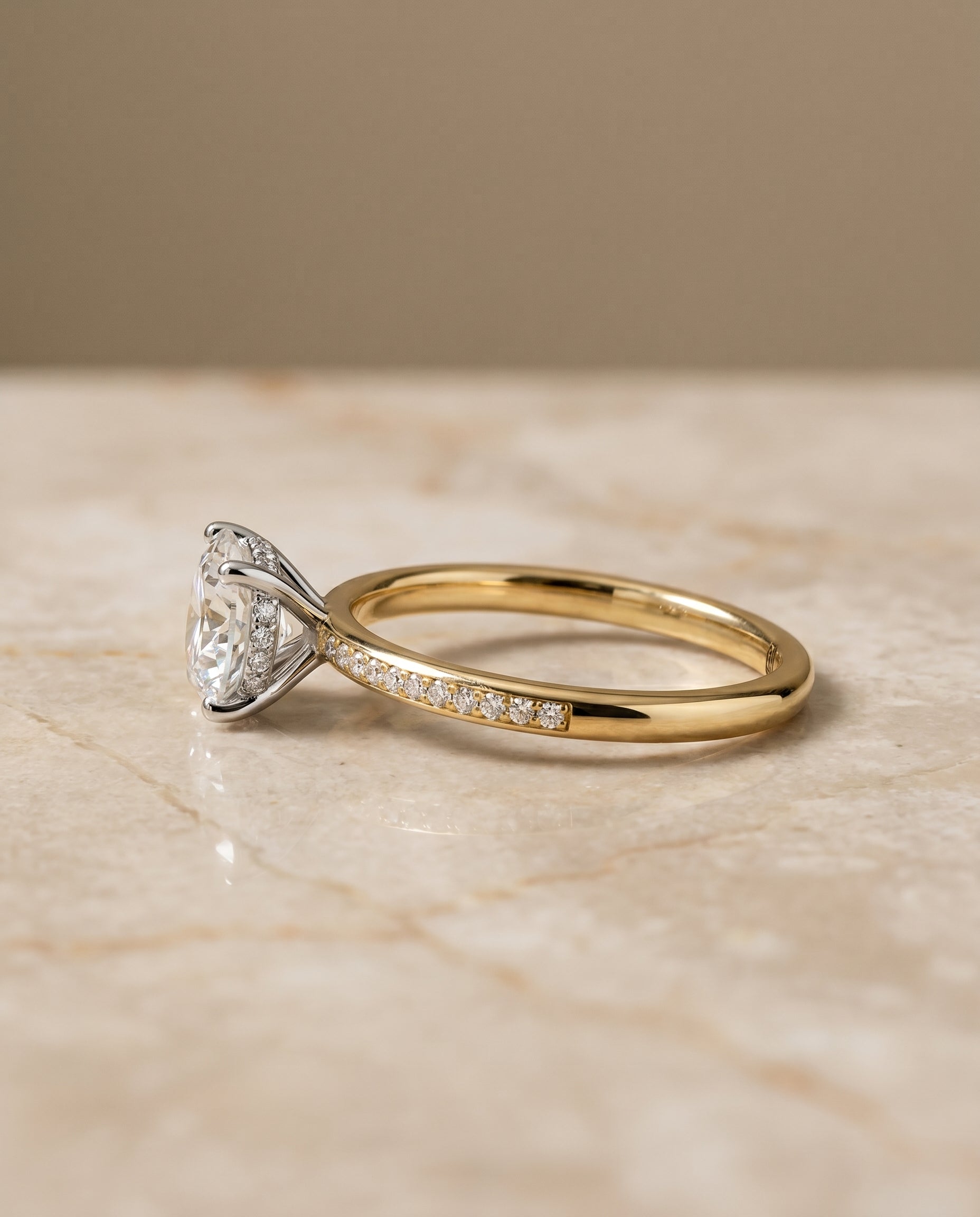 The Brenda high hidden halo solitaire engagement ring setting, shown in 18K Yellow Gold | RockHer
