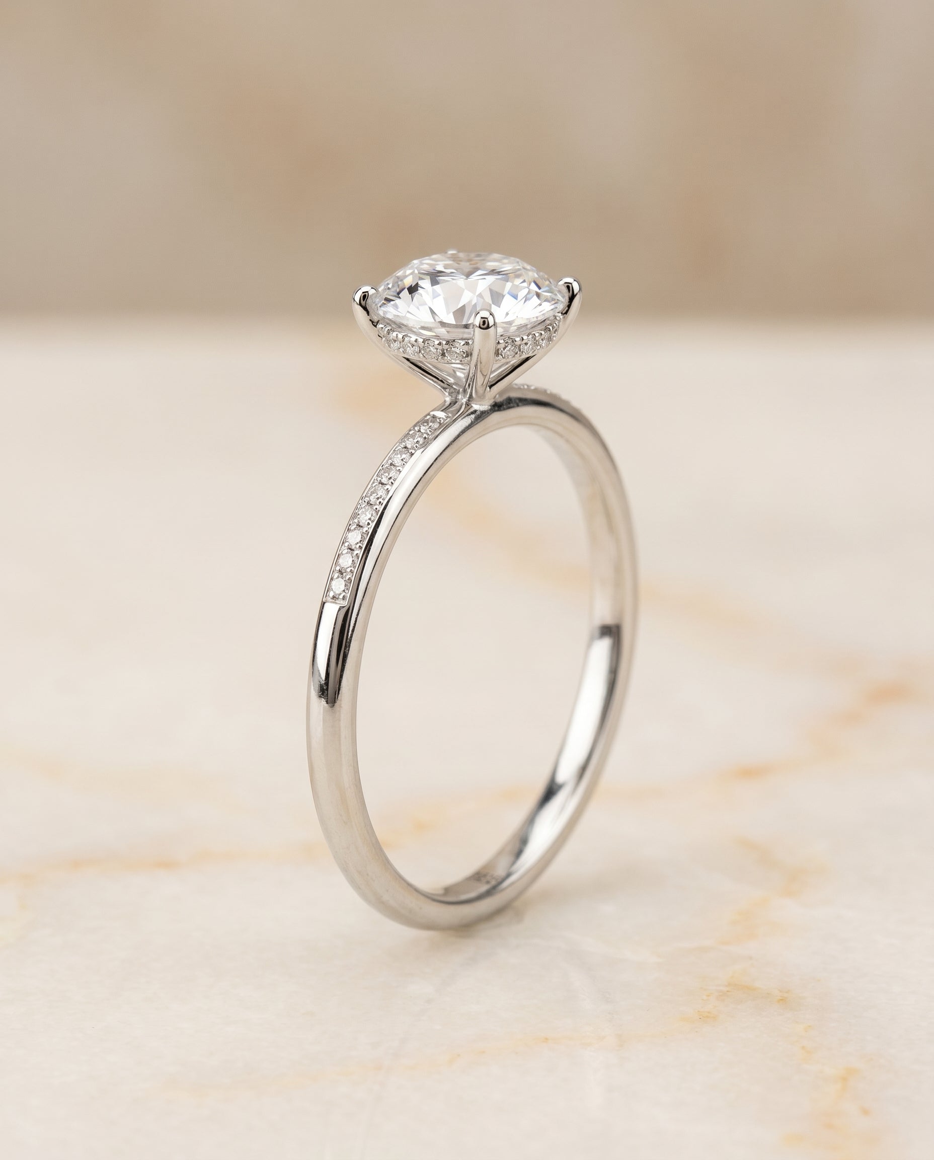 The Brenda high hidden halo solitaire engagement ring setting, shown in 18K White Gold | RockHer