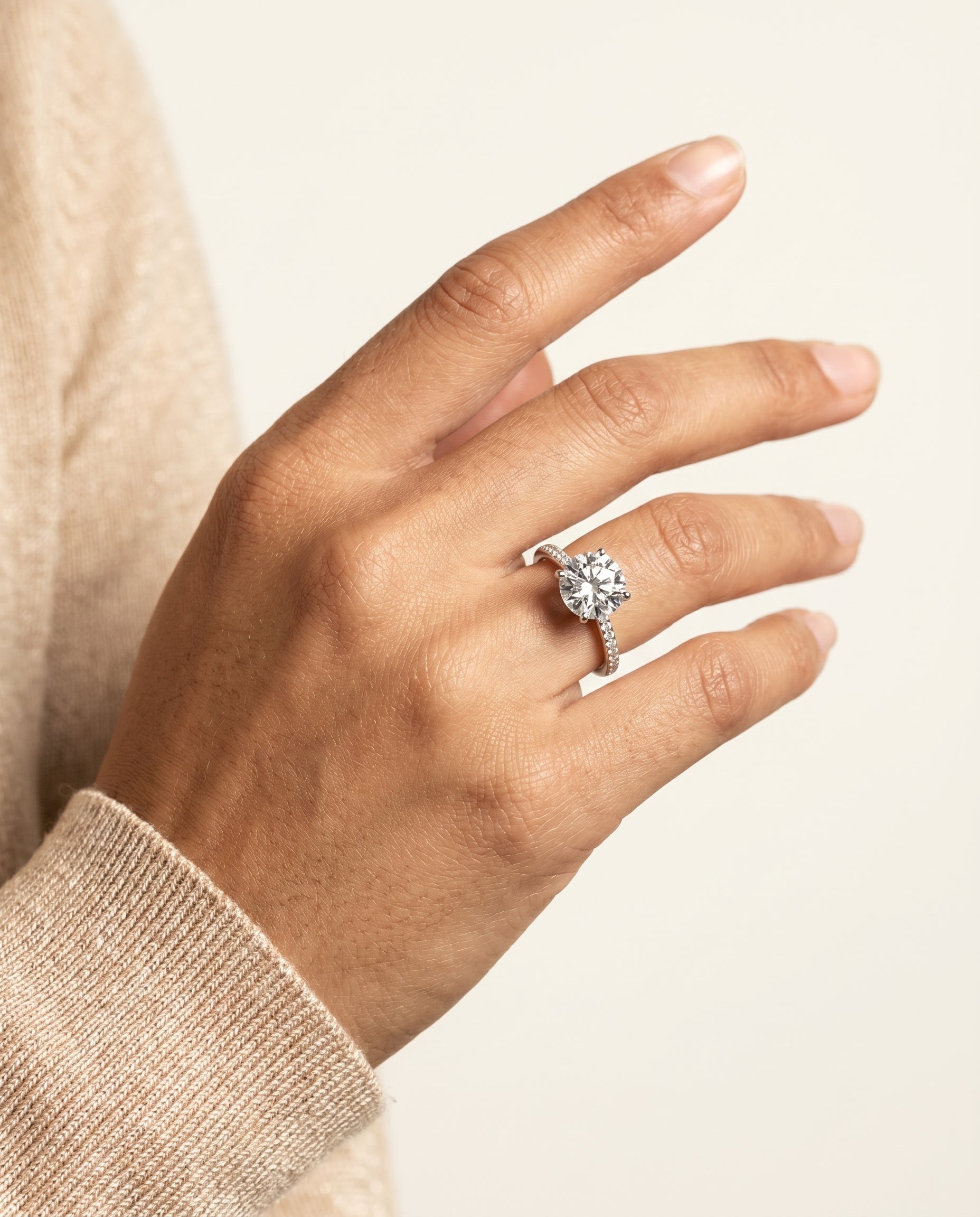 Brenda Select High Hidden Halo Solitaire Round Lab Diamond Engagement Ring in 18K White Gold, shown on hand | RockHer