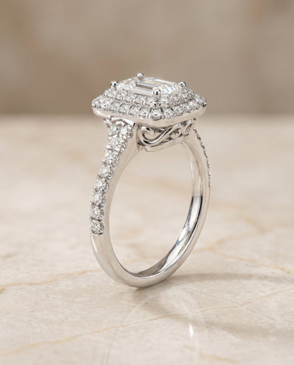 Britney Select Double Halo Emerald Cut Lab Diamond Engagement Ring in 18K White Gold, shown on hand, angled | RockHer