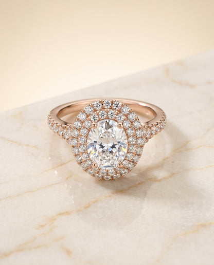 Britney Select Double Halo Oval Lab Diamond Engagement Ring in 14K Rose Gold, shown on hand, angled | RockHer