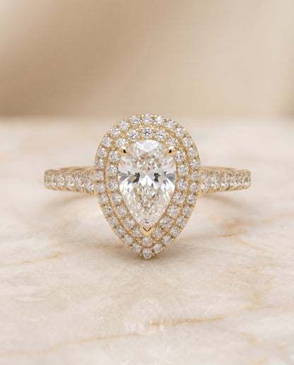 Britney Select Double Halo Pear Lab Diamond Engagement Ring in 18K Yellow Gold, shown on hand, angled | RockHer