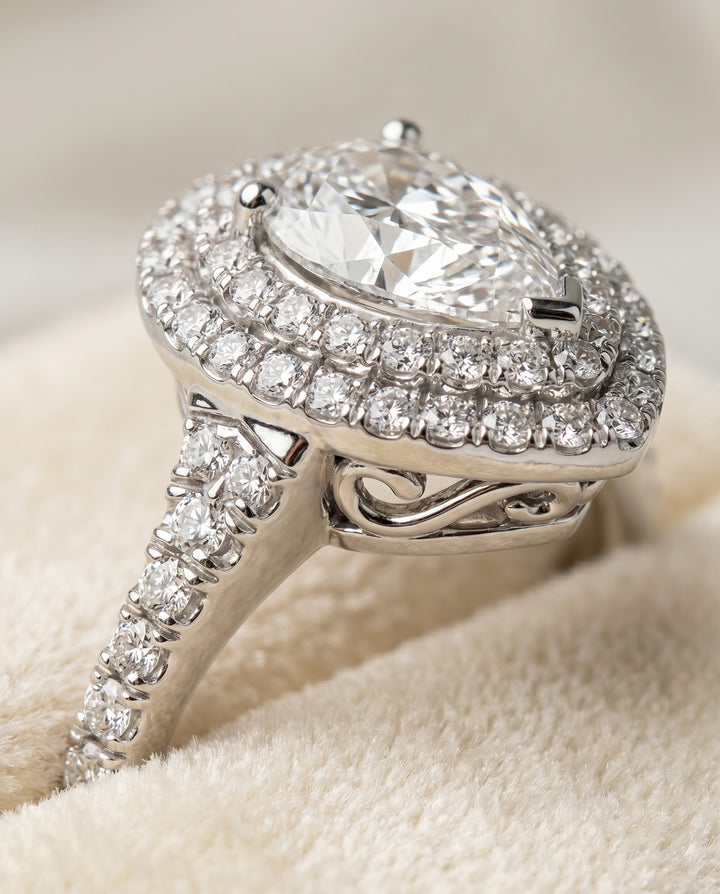 The Britney Halo Engagement Ring Setting for Pear Diamonds in 18K White Gold