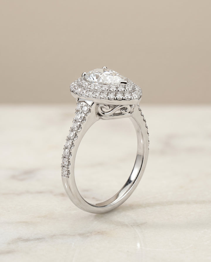 The Britney Halo Engagement Ring Setting for Pear Diamonds in 18K White Gold