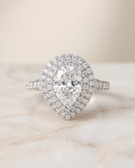 The Britney Halo Engagement Ring Setting for Pear Diamonds in 18K White Gold