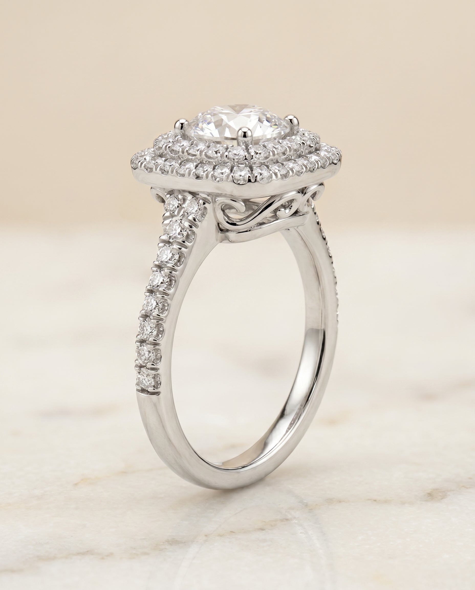 Double Halo styling on The Britney round engagement ring setting | RockHer