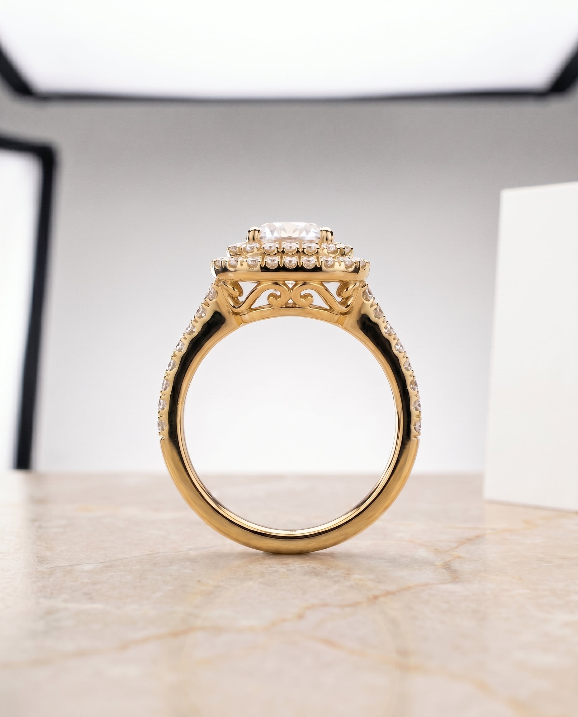 The Britney setting for round diamonds, made to order in 18K Yellow Gold | RockHer