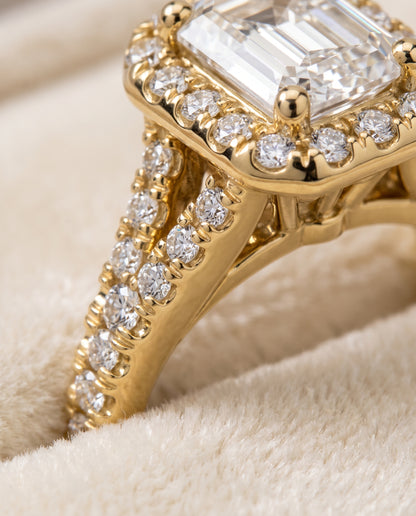The Calliope Petite Split Shank Halo Emerald Cut Engagement Ring Setting in 18K Yellow Gold