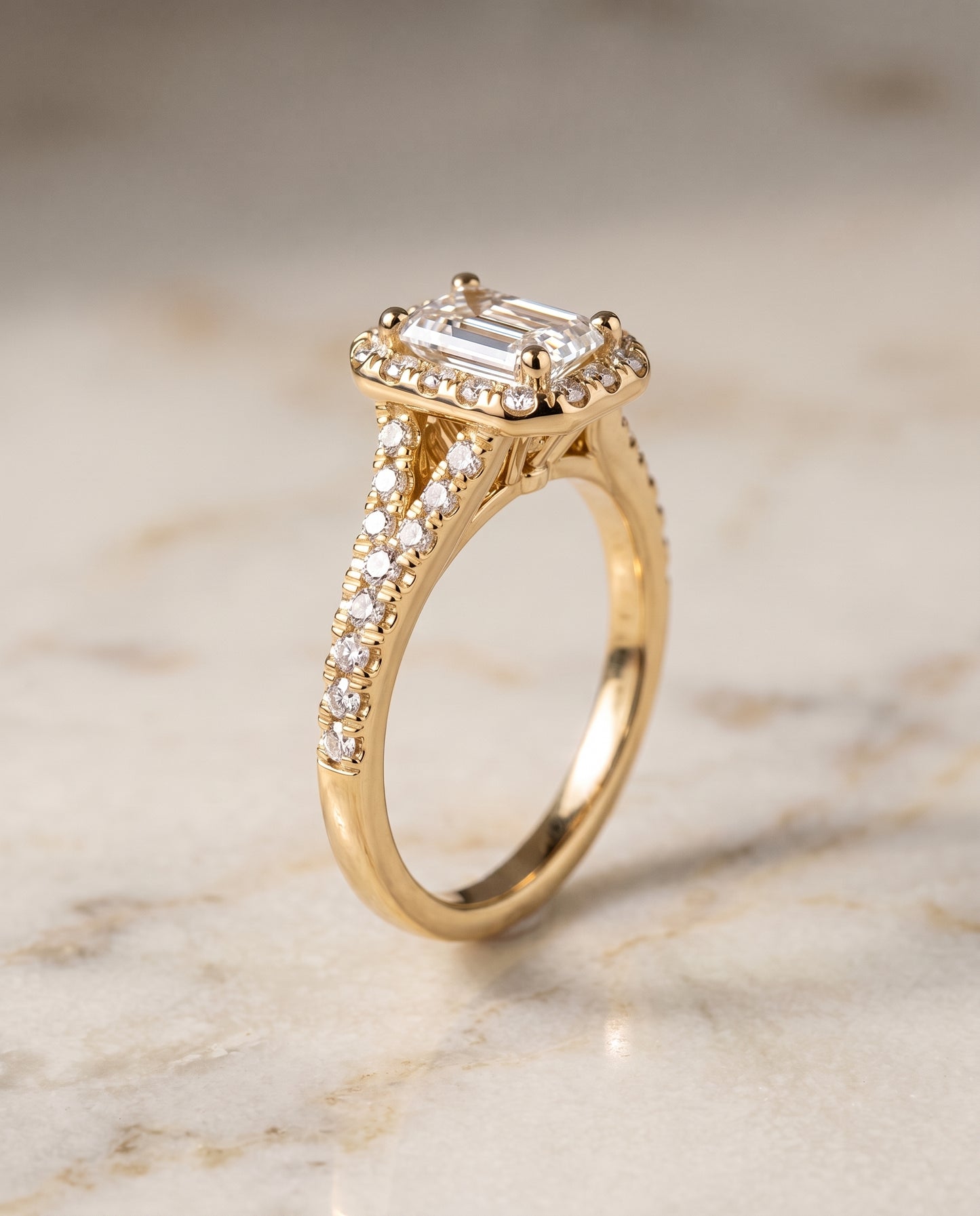 The Calliope Petite Split Shank Halo Emerald Cut Engagement Ring Setting in 18K Yellow Gold
