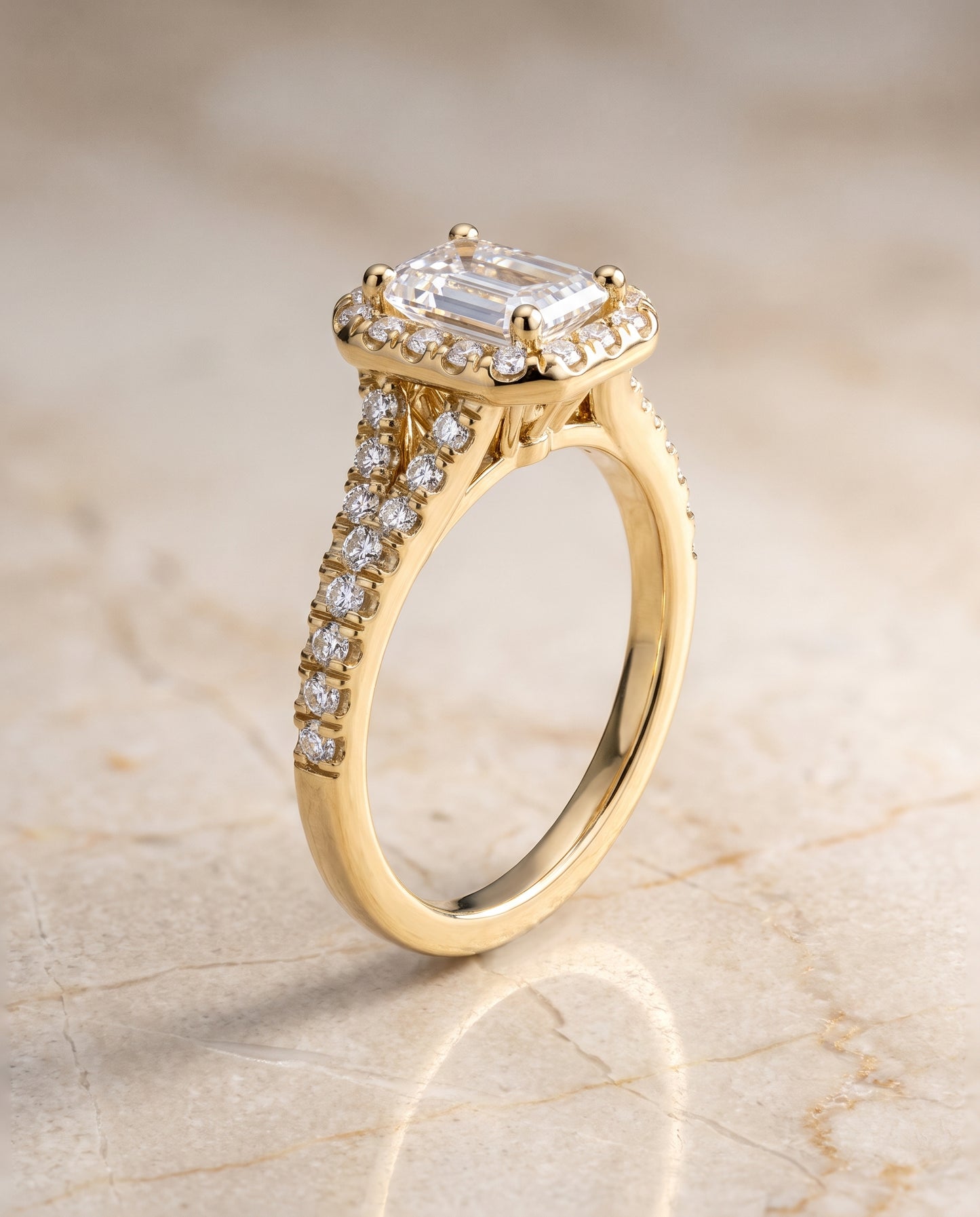 The Calliope Petite Split Shank Halo Emerald Cut Engagement Ring Setting in 18K Yellow Gold
