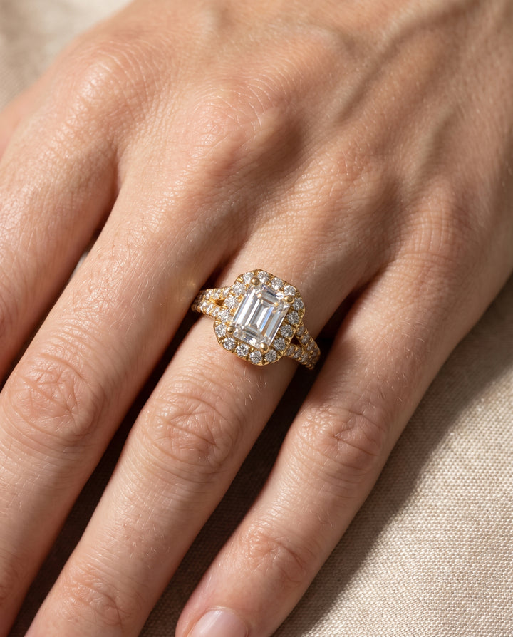 The Calliope Petite Split Shank Halo Emerald Cut Engagement Ring Setting in 18K Yellow Gold