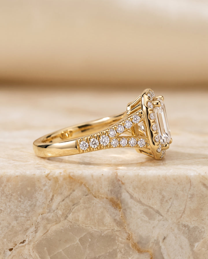 The Calliope Petite Split Shank Halo Emerald Cut Engagement Ring Setting in 18K Yellow Gold