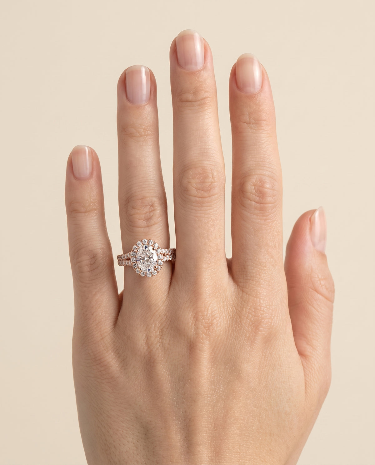 The Calliope Petite Split Shank Halo Oval Engagement Ring Setting in 14K Rose Gold