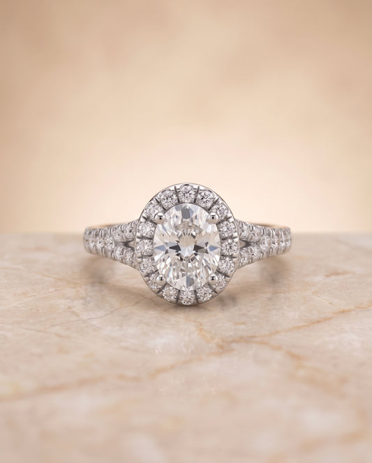 The Calliope Petite Split Shank Halo Oval Engagement Ring Setting in 18K White Gold