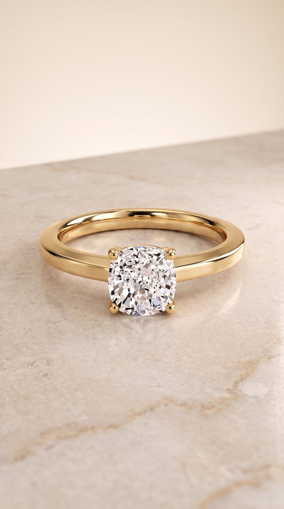 Carmen Select Solitaire Cushion Cut Lab Diamond Engagement Ring in 18K Yellow Gold, shown on hand, angled | RockHer