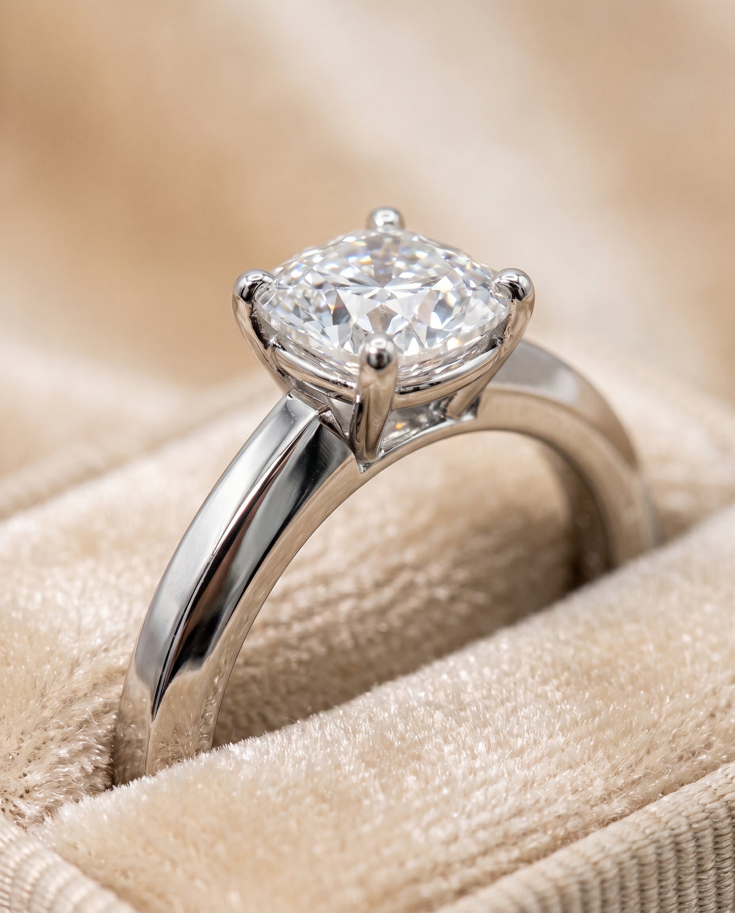 The Carmen Beveled Edge Comfort Fit Solitaire Cushion Cut Engagement Ring Setting in Platinum