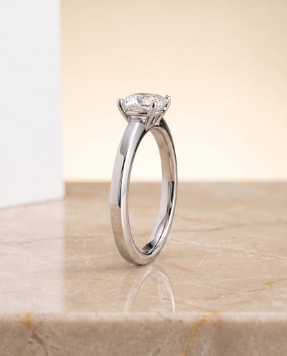 The Carmen Beveled Edge Comfort Fit Solitaire Cushion Cut Engagement Ring Setting in Platinum