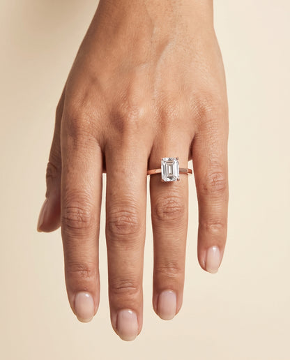 The Carmen Beveled Edge Comfort Fit Solitaire Emerald Cut Engagement Ring Setting in 14K Rose Gold