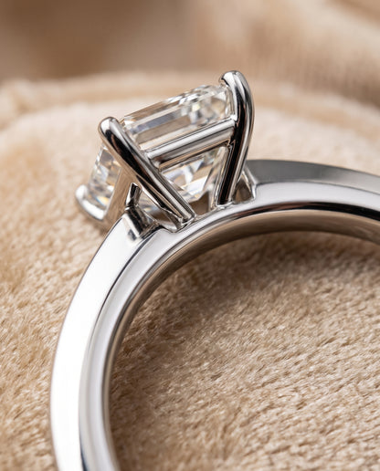 The Carmen Beveled Edge Comfort Fit Solitaire Emerald Cut Engagement Ring Setting in 18K White Gold