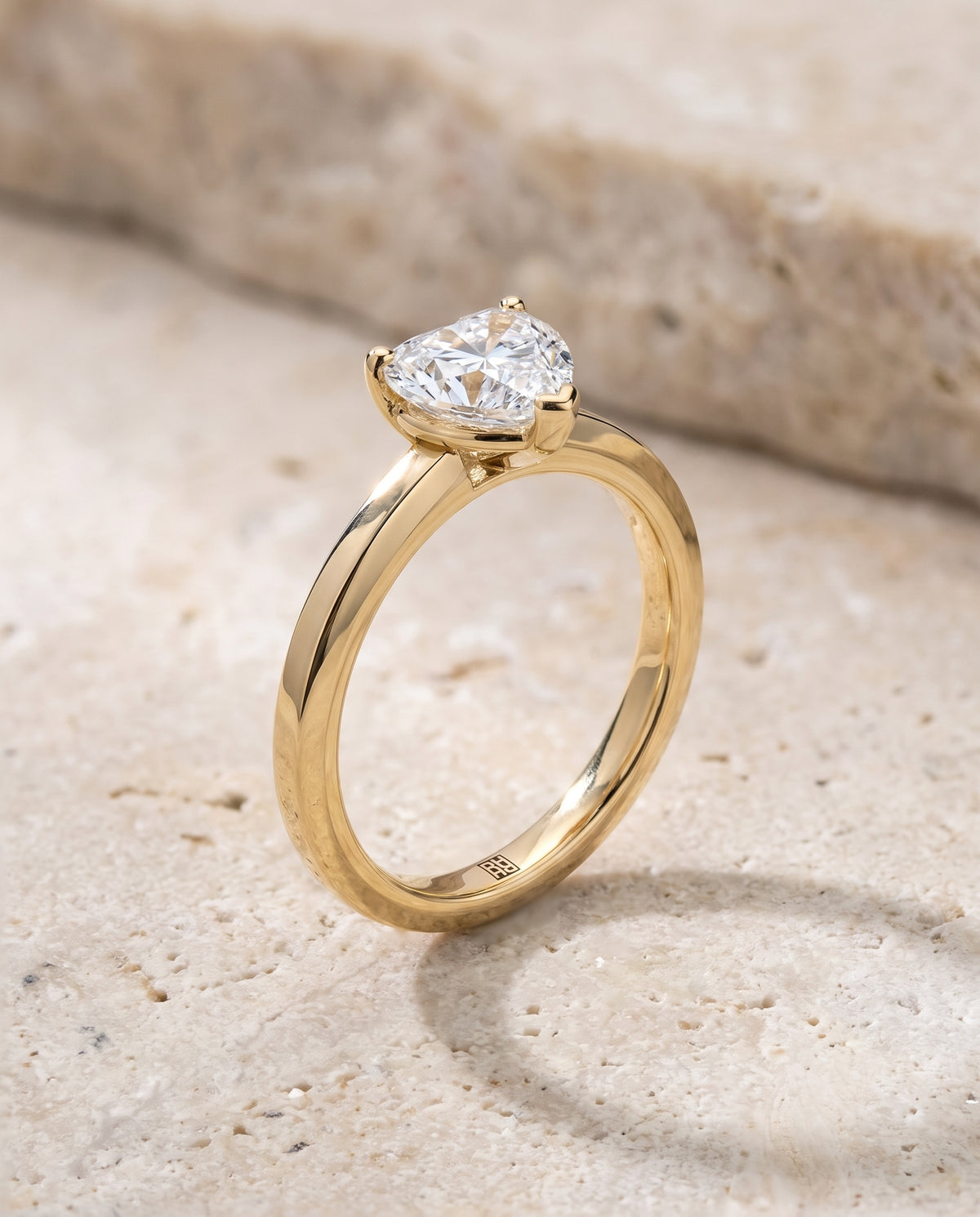 The Carmen Beveled Edge Comfort Fit Solitaire Heart Engagement Ring Setting in 18K Yellow Gold