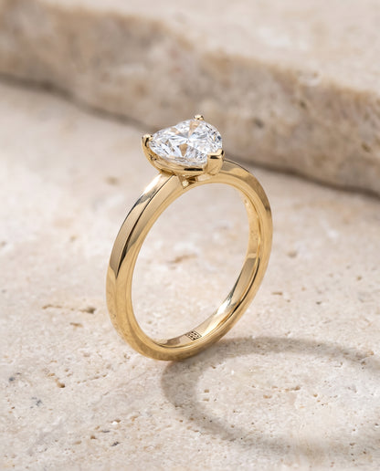 The Carmen Beveled Edge Comfort Fit Solitaire Heart Engagement Ring Setting in 18K Yellow Gold