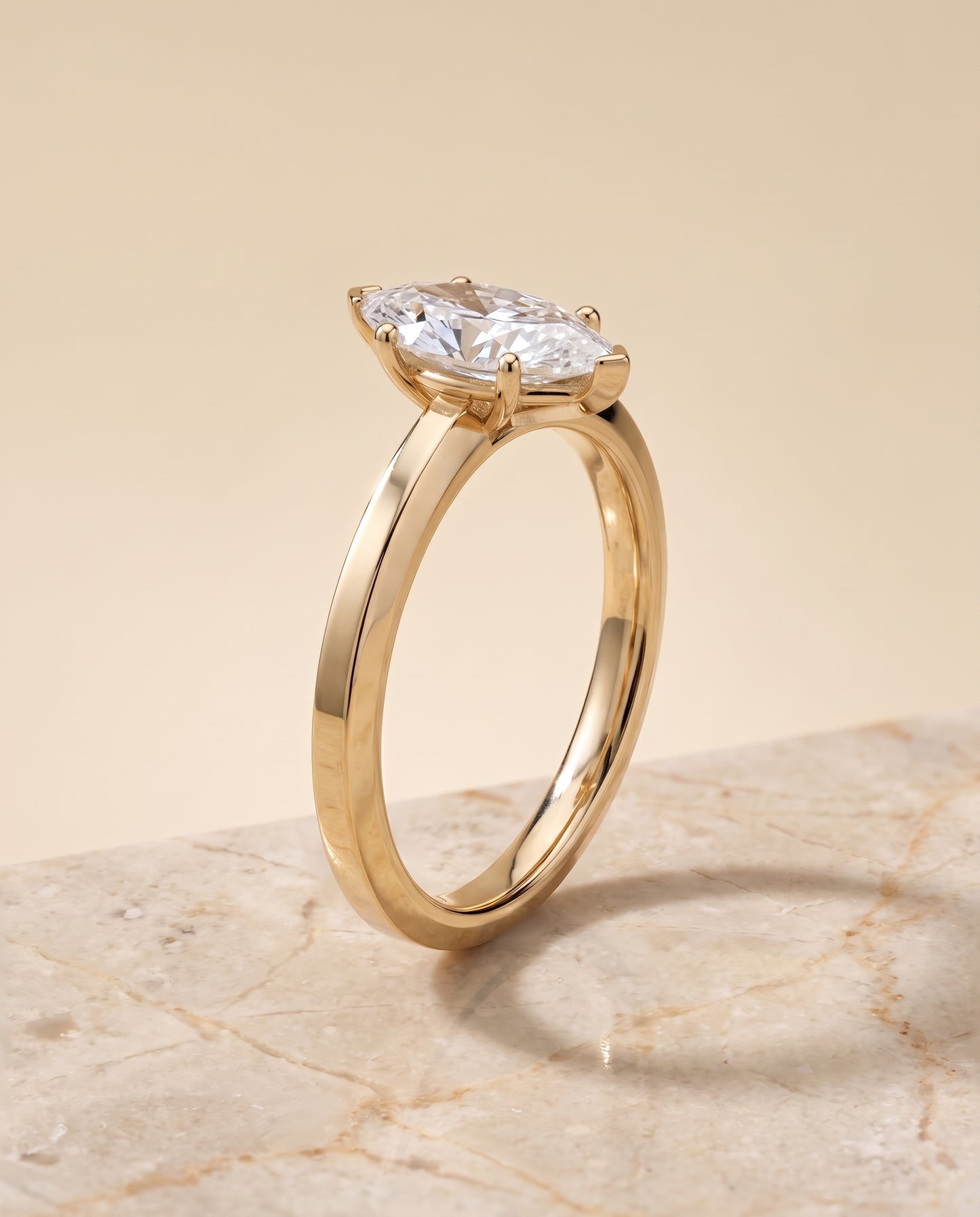The Carmen Beveled Edge Comfort Fit Solitaire Marquise Engagement Ring Setting in 18K Yellow Gold