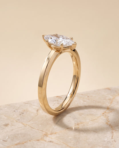 The Carmen Beveled Edge Comfort Fit Solitaire Marquise Engagement Ring Setting in 18K Yellow Gold
