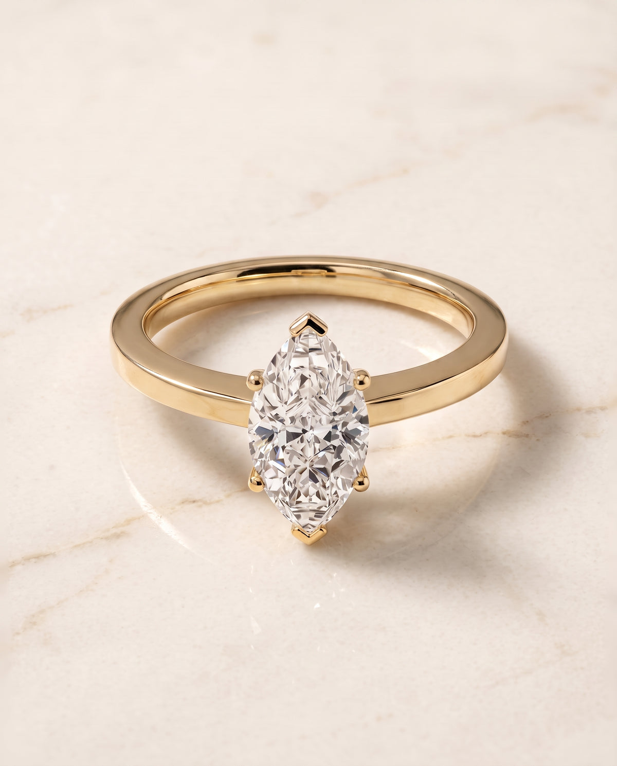 The Carmen Beveled Edge Comfort Fit Solitaire Marquise Engagement Ring Setting in 18K Yellow Gold