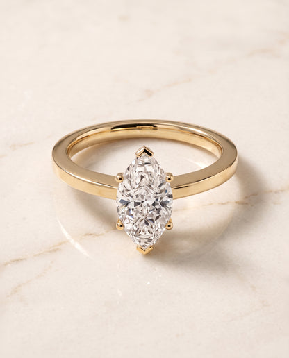 The Carmen Beveled Edge Comfort Fit Solitaire Marquise Engagement Ring Setting in 18K Yellow Gold
