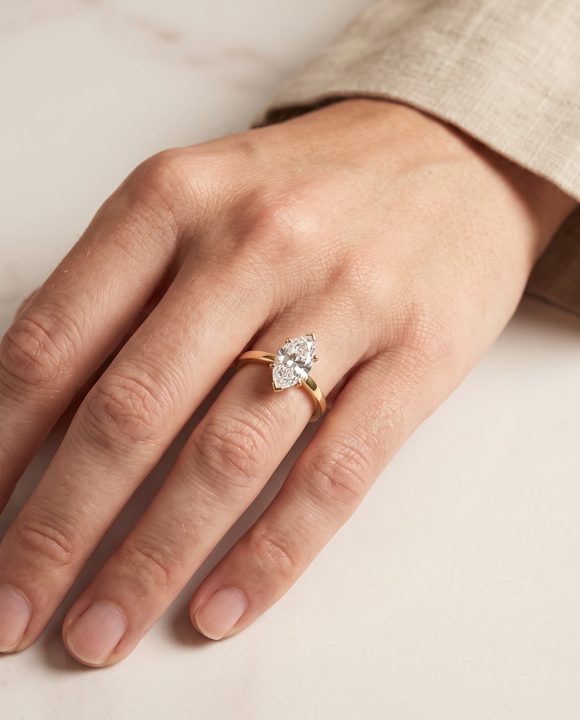 The Carmen Beveled Edge Comfort Fit Solitaire Marquise Engagement Ring Setting in 18K Yellow Gold
