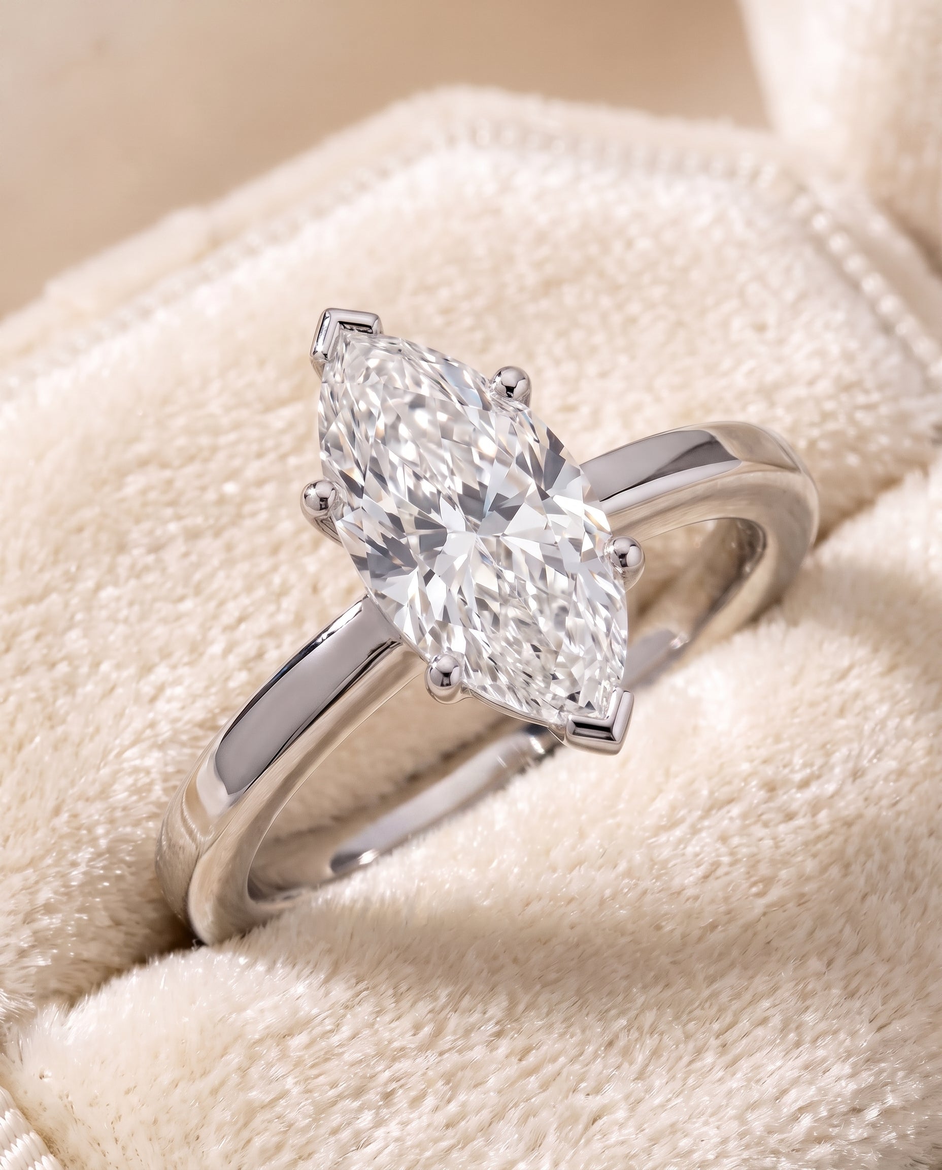 The Carmen Beveled Edge Comfort Fit Solitaire Marquise Engagement Ring Setting in 18K White Gold