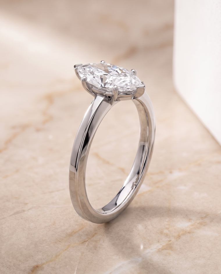 The Carmen Beveled Edge Comfort Fit Solitaire Marquise Engagement Ring Setting in 18K White Gold