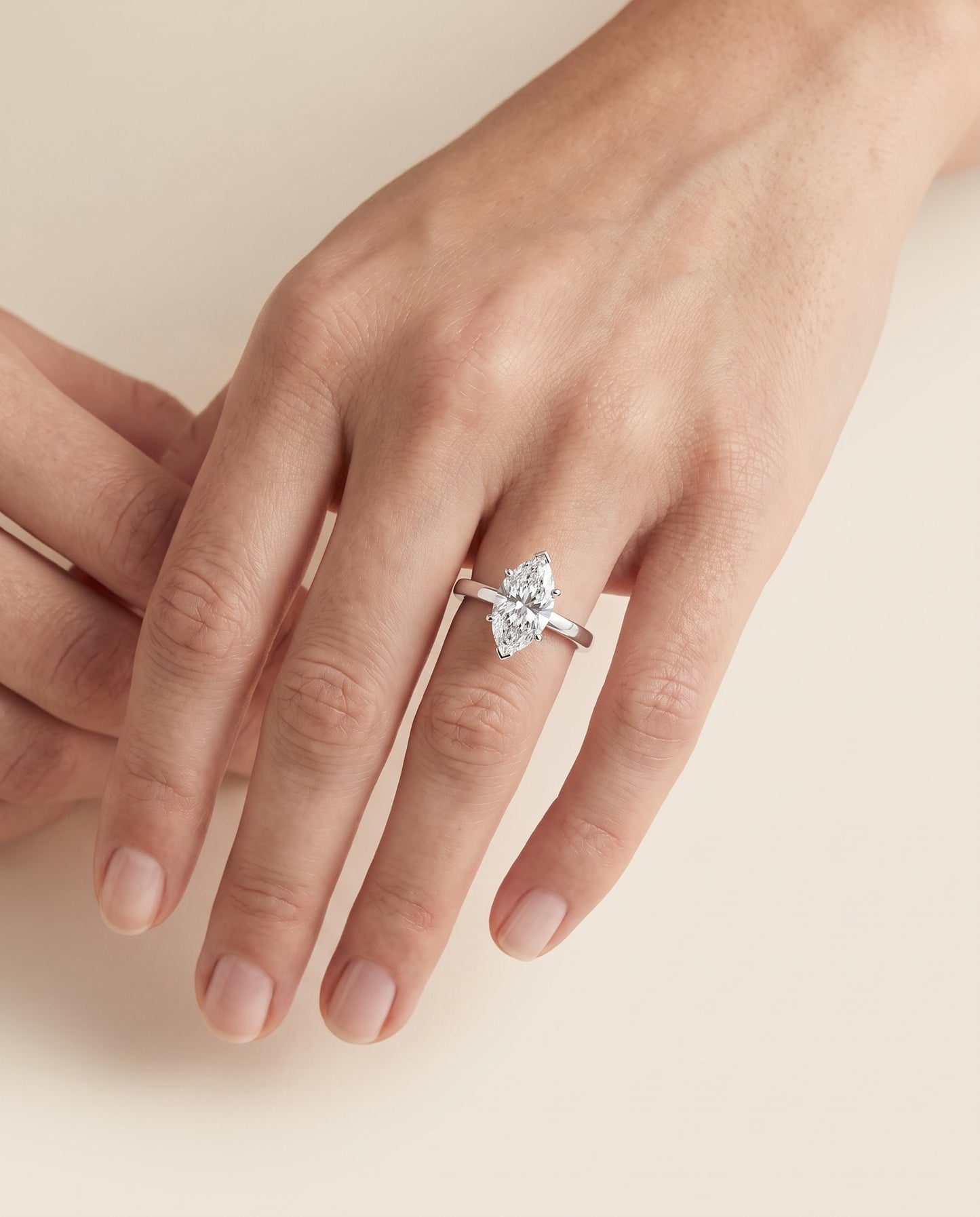 The Carmen Beveled Edge Comfort Fit Solitaire Marquise Engagement Ring Setting in 18K White Gold