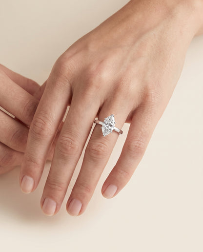 The Carmen Beveled Edge Comfort Fit Solitaire Marquise Engagement Ring Setting in 18K White Gold