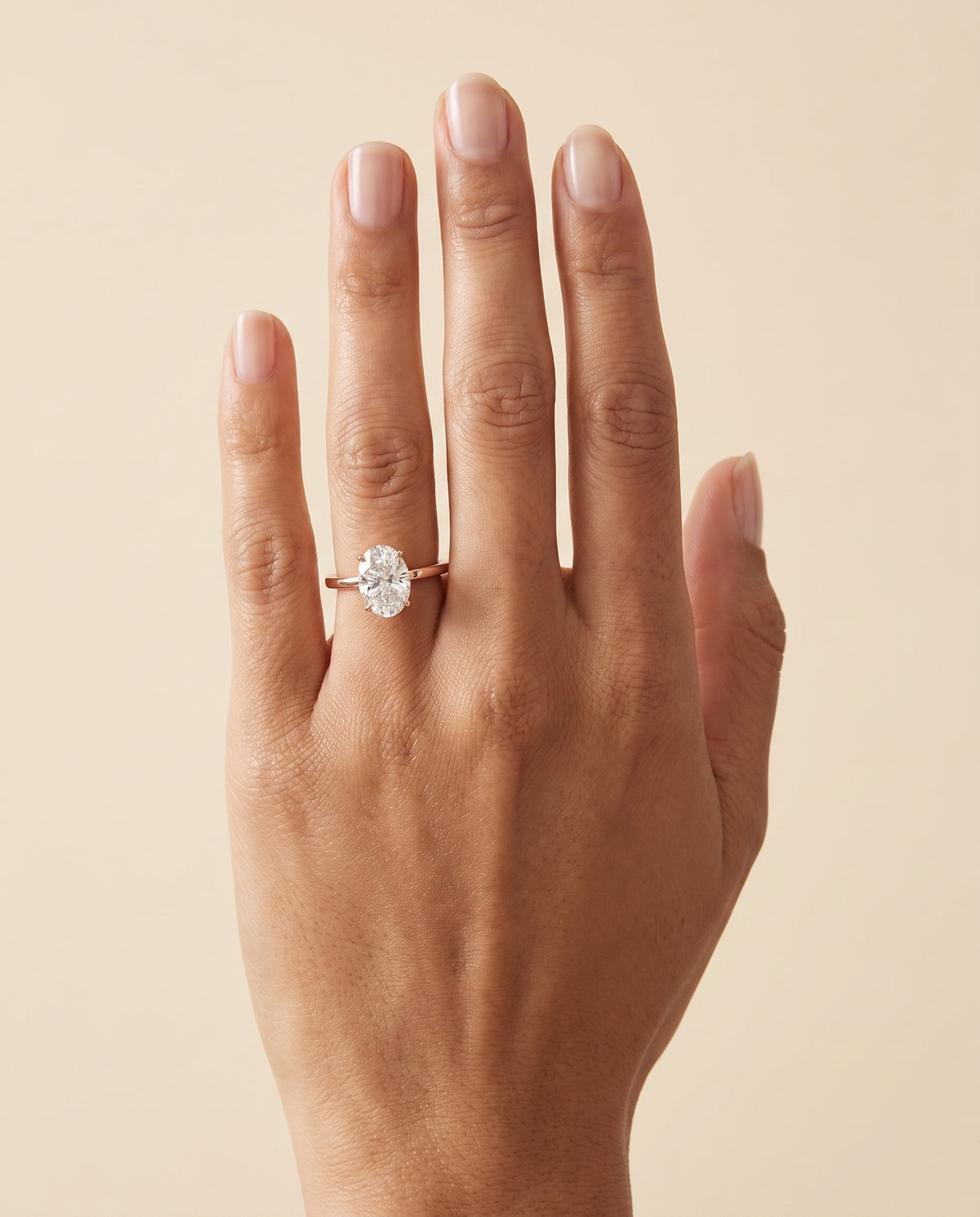 The Carmen Beveled Edge Comfort Fit Solitaire Oval Engagement Ring Setting in 14K Rose Gold