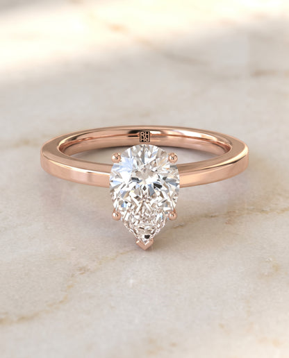 The Carmen Beveled Edge Comfort Fit Solitaire Pear Engagement Ring Setting in 14K Rose Gold
