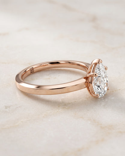 The Carmen Beveled Edge Comfort Fit Solitaire Pear Engagement Ring Setting in 14K Rose Gold