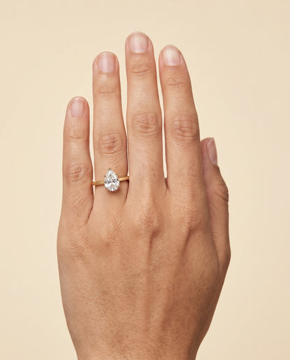 The Carmen Beveled Edge Comfort Fit Solitaire Pear Engagement Ring Setting in 18K Yellow Gold