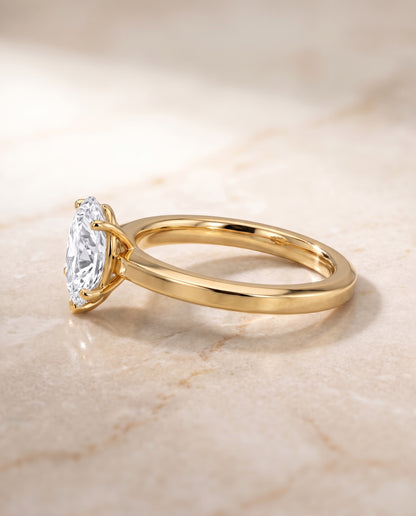 The Carmen Beveled Edge Comfort Fit Solitaire Pear Engagement Ring Setting in 18K Yellow Gold