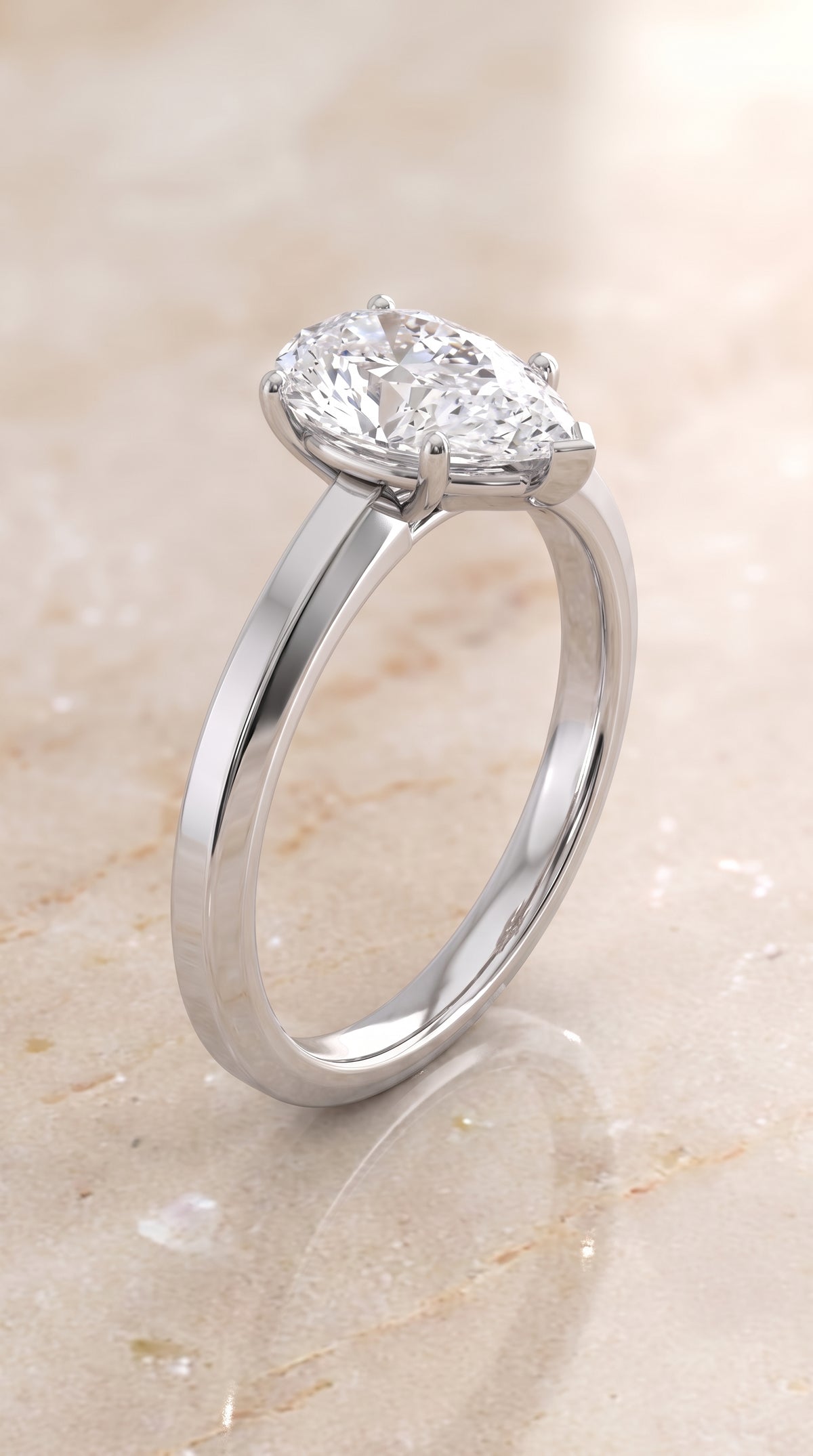 The Carmen Beveled Edge Comfort Fit Solitaire Pear Engagement Ring Setting in 18K White Gold