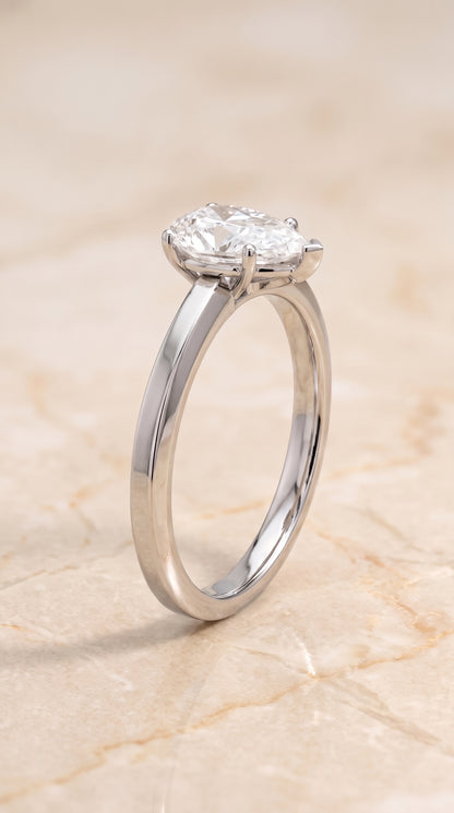 The Carmen Beveled Edge Comfort Fit Solitaire Pear Engagement Ring Setting in 18K White Gold